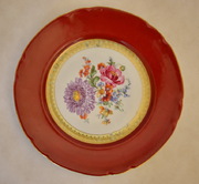 Porcelánový dekorační červený talíř